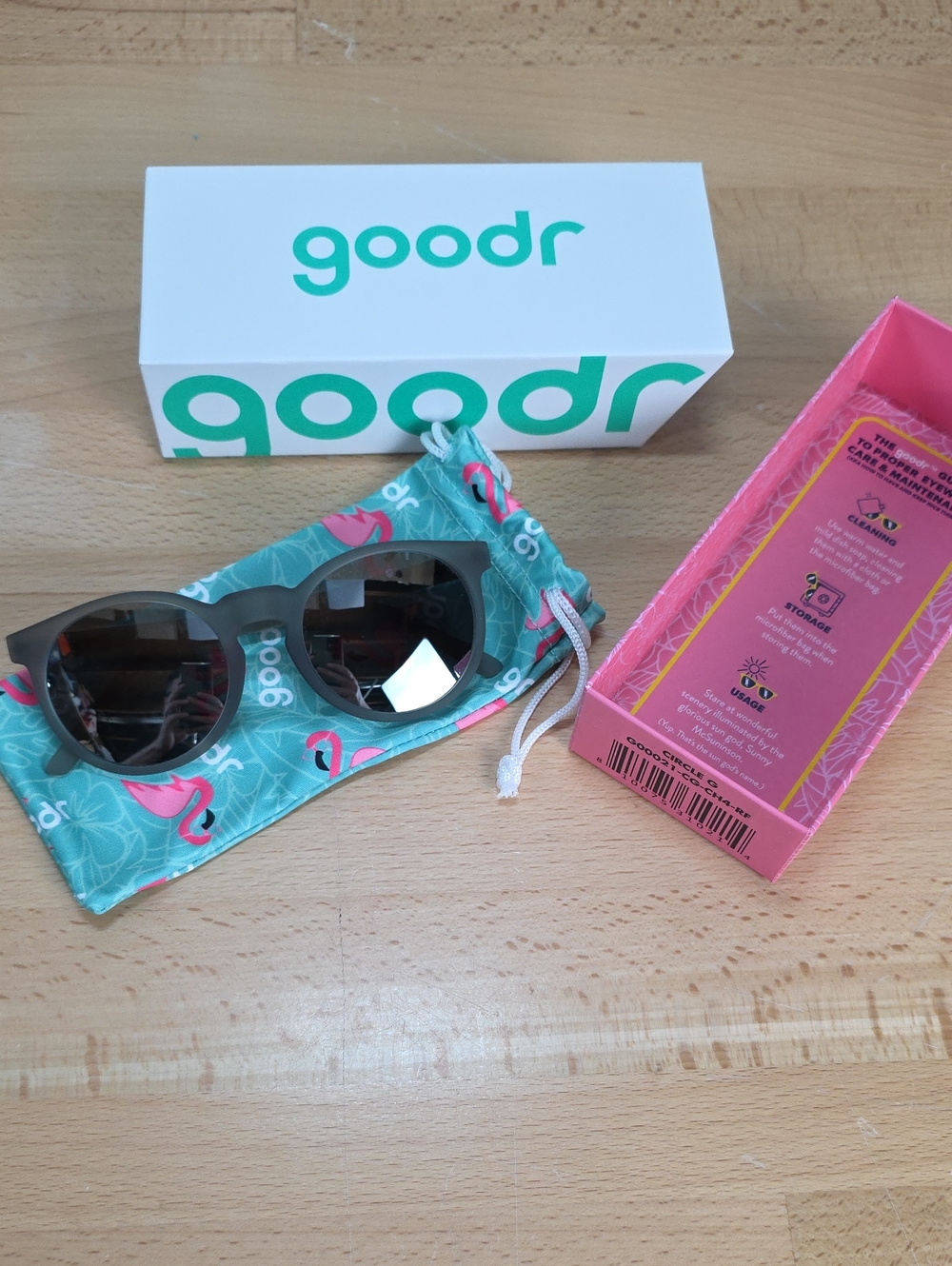 Goodr Gray Sunglasses with Teal Flamingo Pouch Circle G